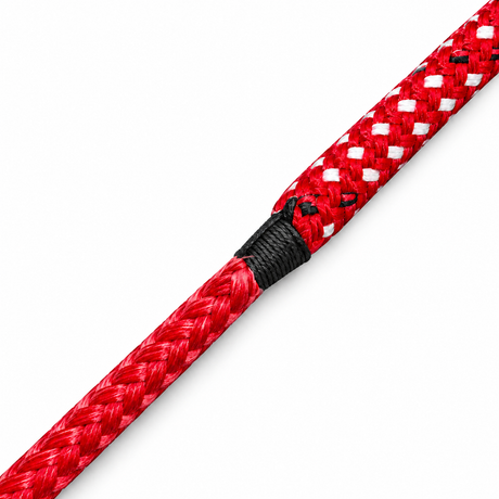 Illustrative view of a stripped rope cover transitioning to a thinner exposed braided core.
